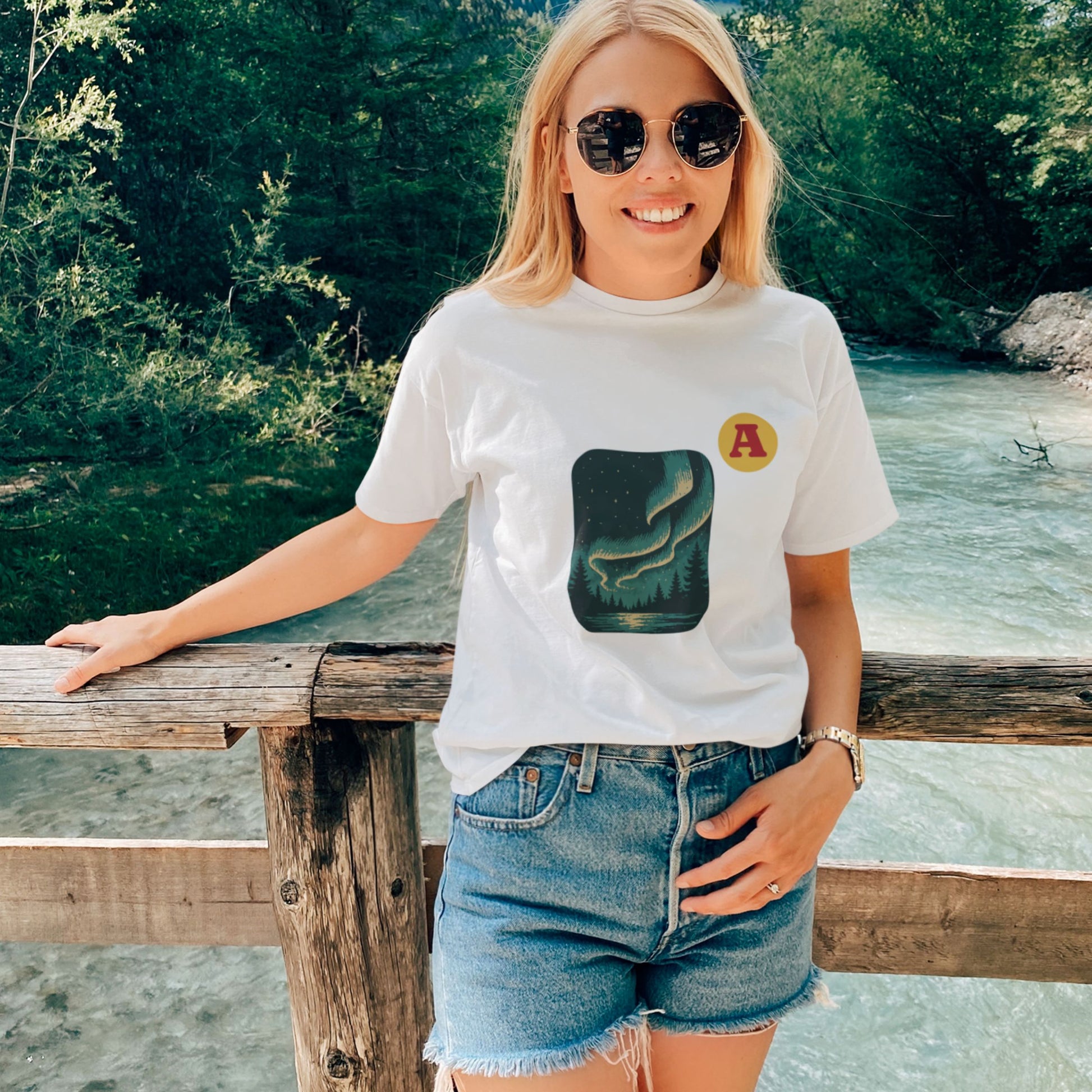 Woman wearing a White Northern lights Aurora T shirt from the Canadian ABC collection by Maple Beaver