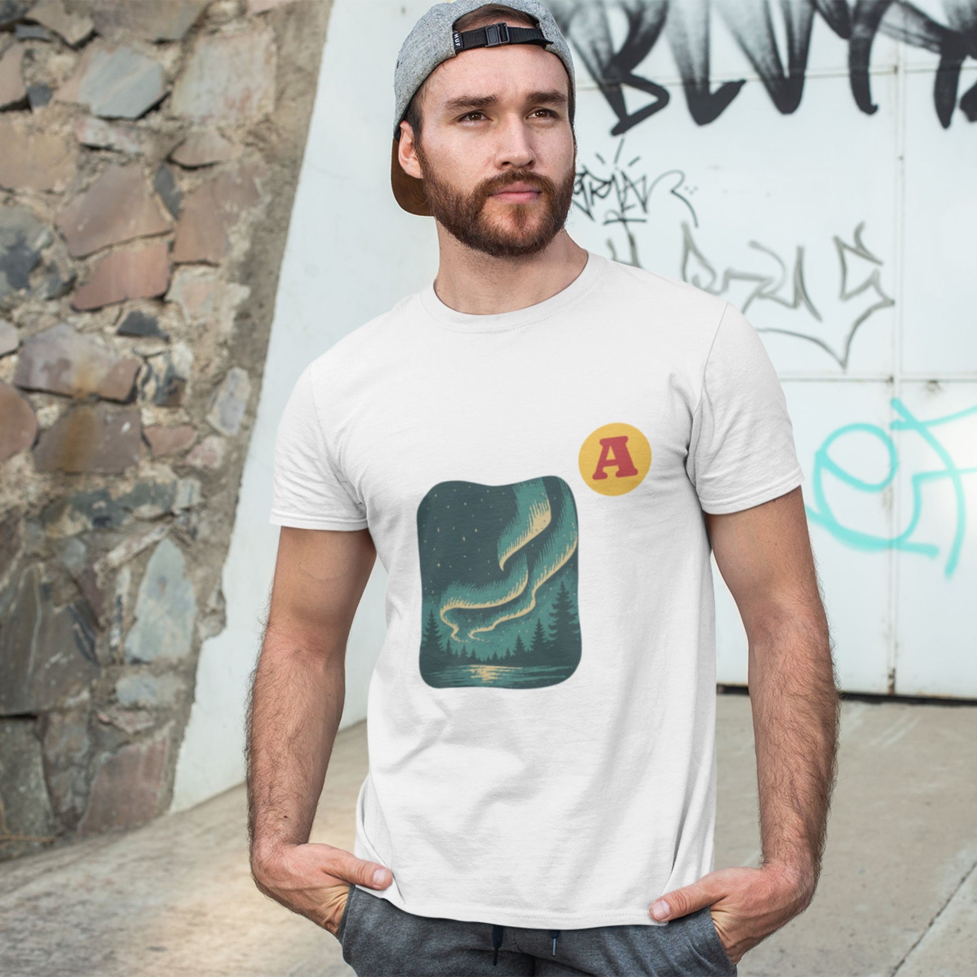 Man wearing a white Northern lights Aurora T shirt from the Canadian ABC collection by Maple Beaver