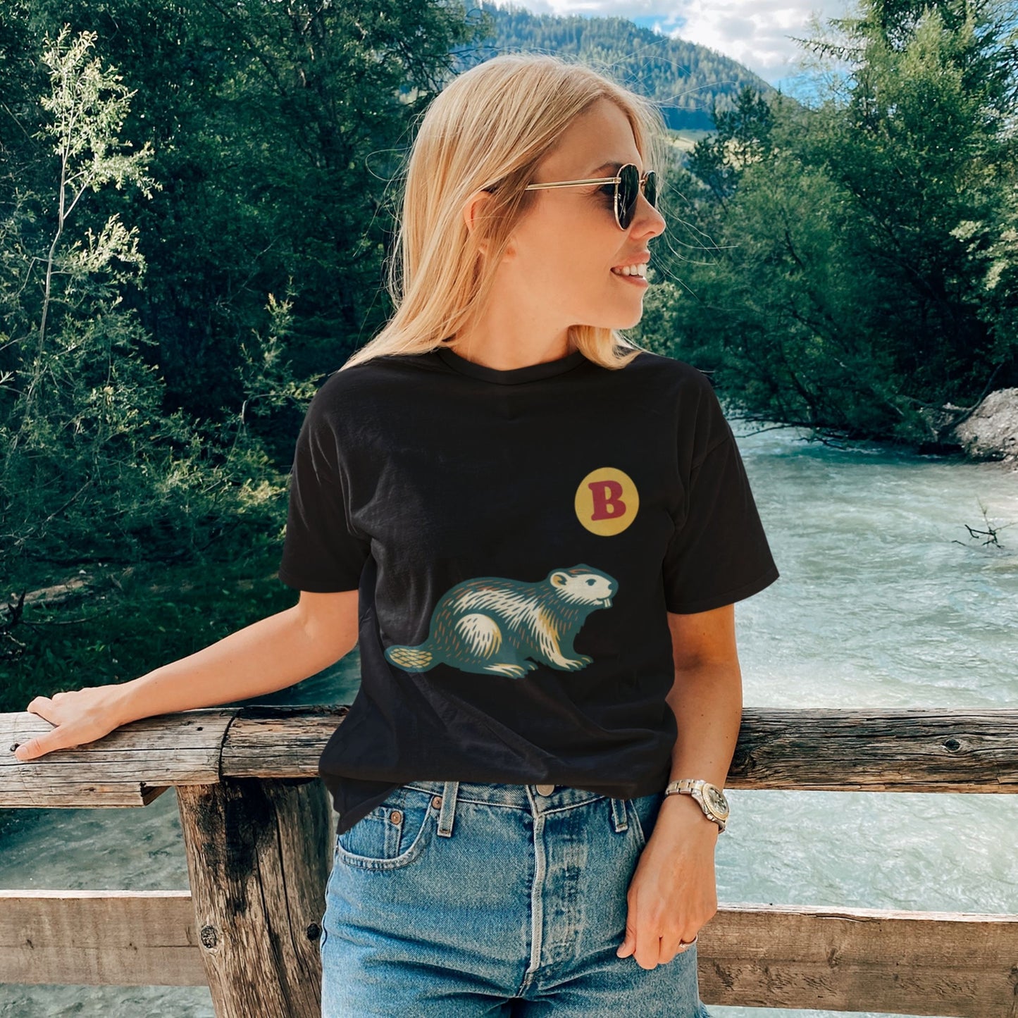 Woman wearing the Beaver T Shirt in black colour, made in Canada with Organic Cotton from the Maple Beaver Canadian ABC collection