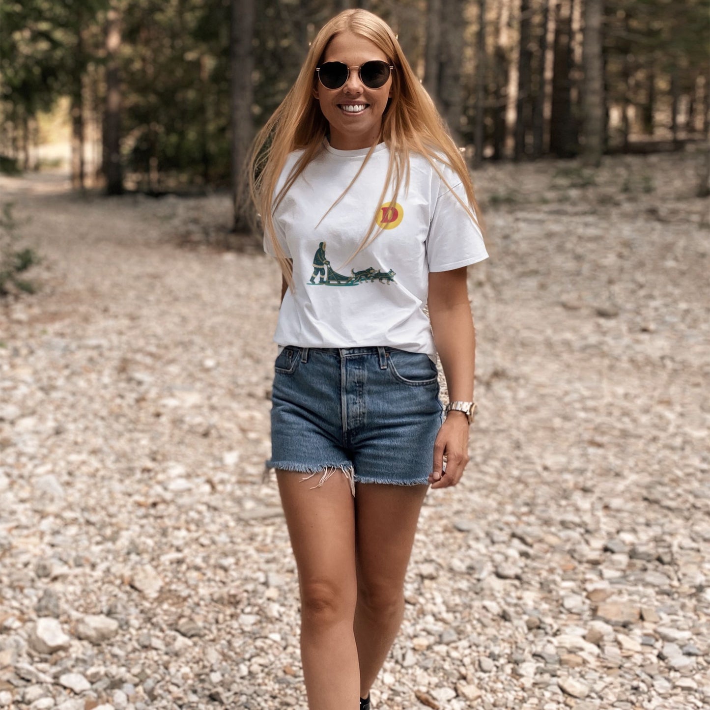 Woman wearing a White colour Canadian Dog Sled T shirt from the Canadian ABC collection by Maple Beaver