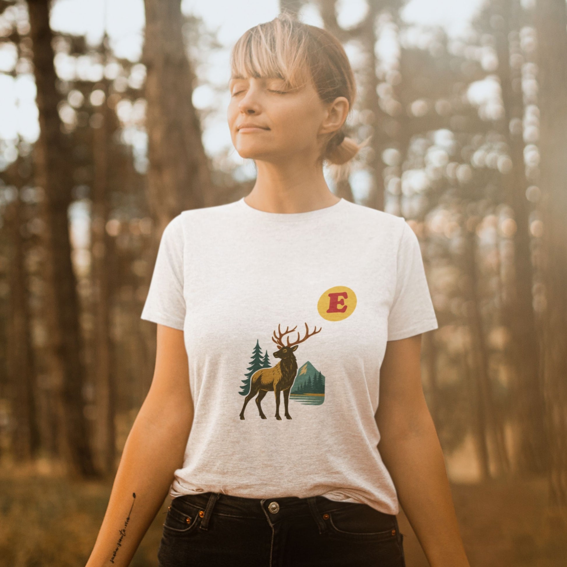 Woman wearing a Canadain Elk T Shirt in White colour from the Canadian ABC collection by Maple Beaver