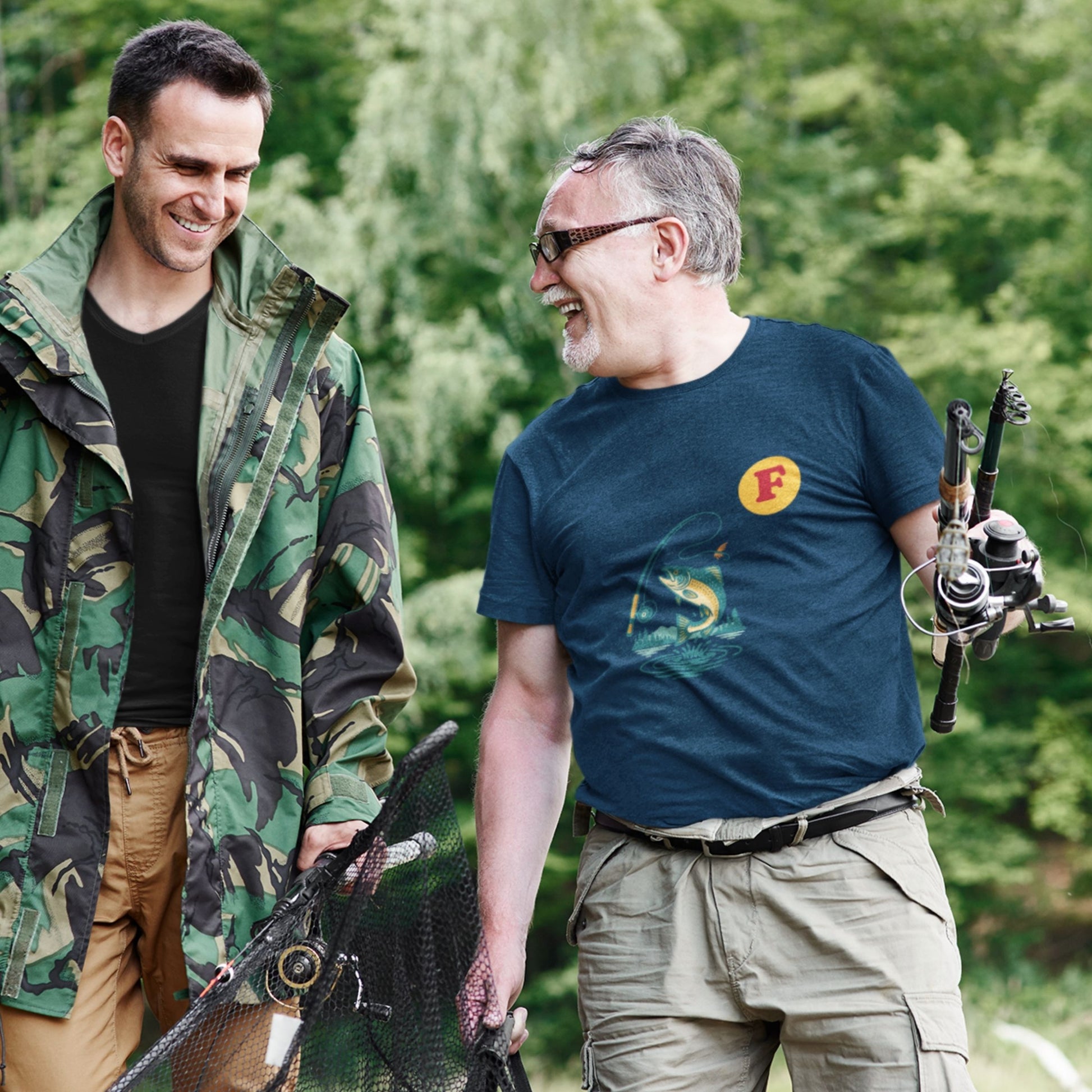 Man wearing the Made in Canada Fishing T Shirt in Navy colour from the Canadian ABC collection by Maple Beaver