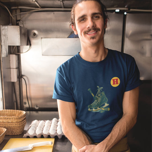 Man wearing a Navy colour Canadian Made Hockey T Shirt in Organic Cotton from the Canadian ABC collection by Maple Beaver