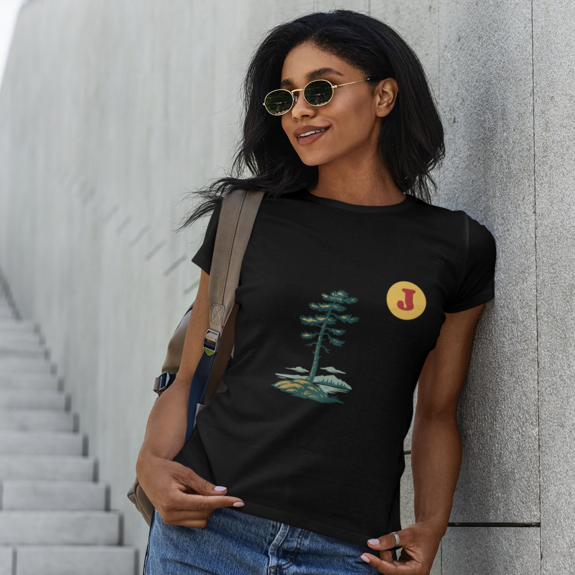 Woman wearing a Canadian Jack Pine T Shirt in Black colour from the Canadian ABC collection by Maple Beaver
