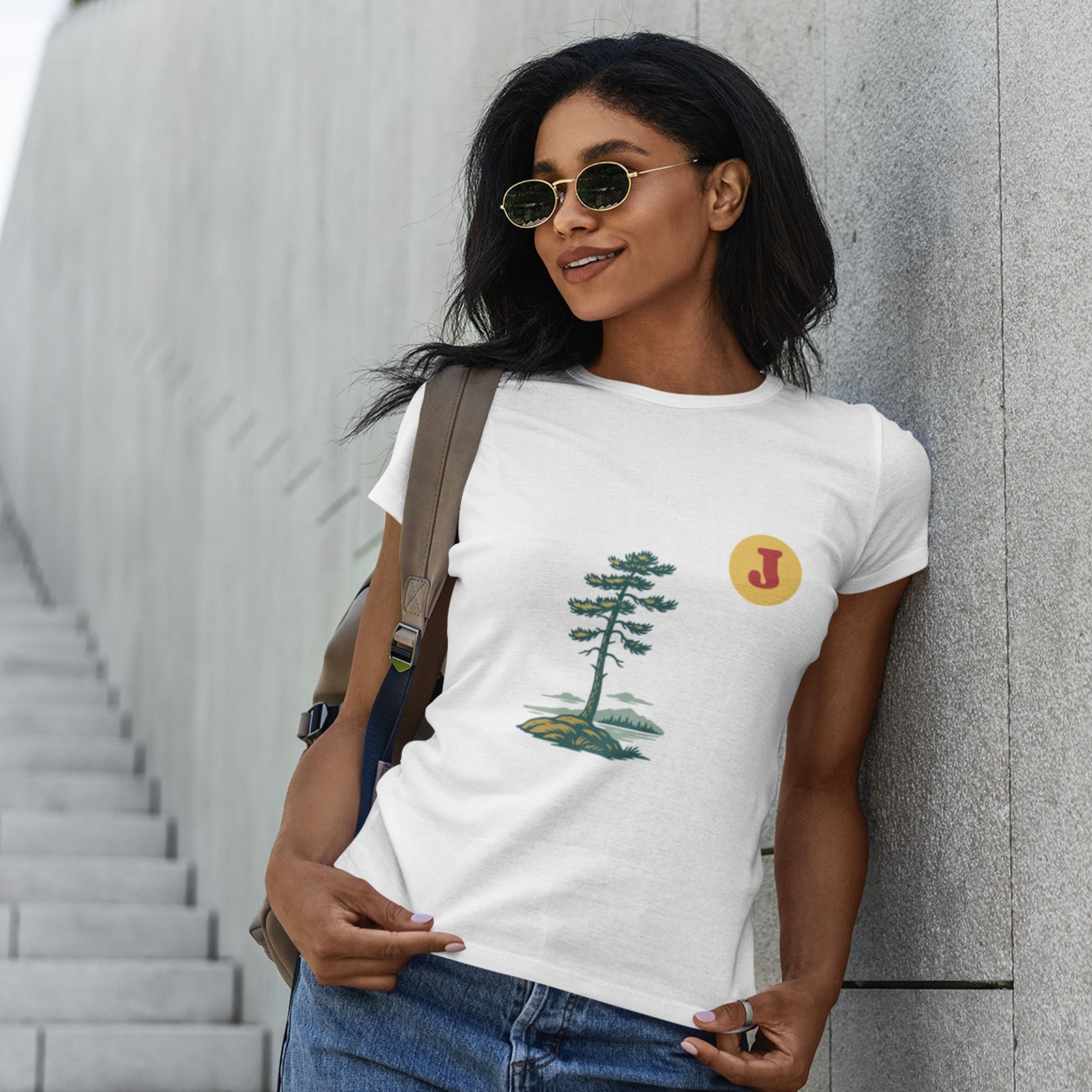 Woman wearing a Canadian Jack Pine T Shirt in White colour from the Canadian ABC collection by Maple Beaver