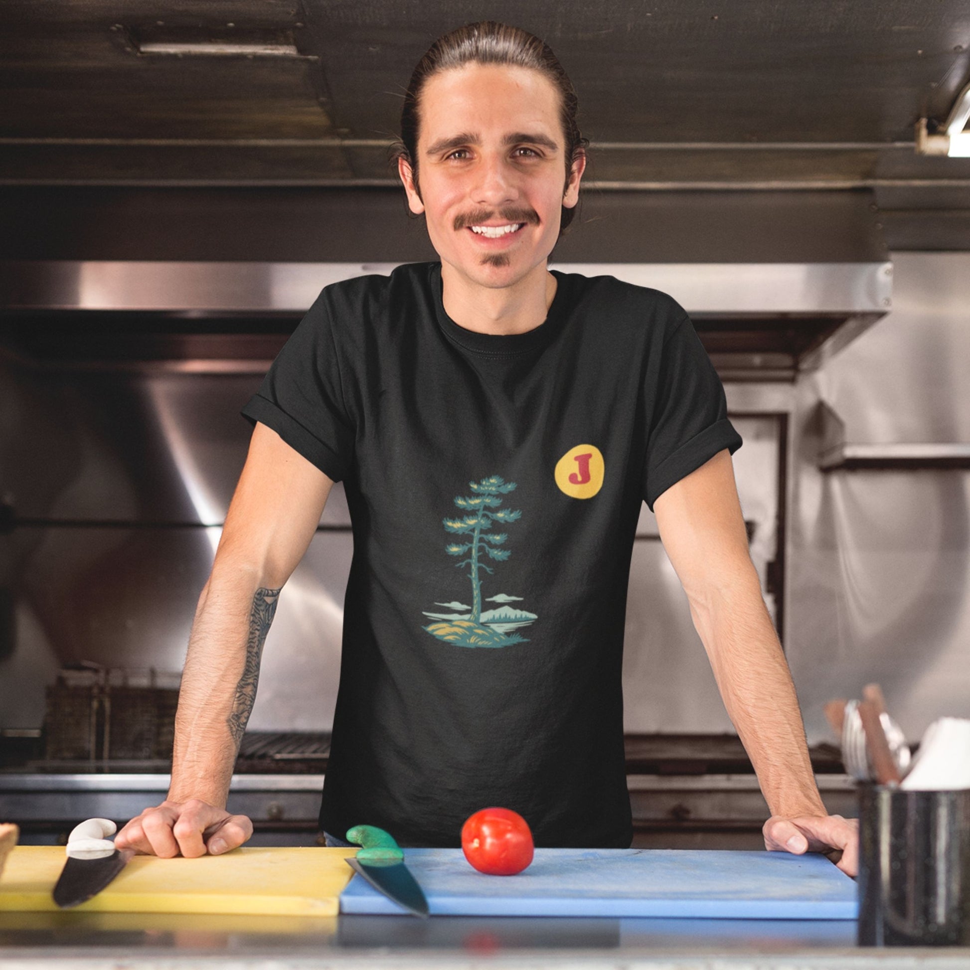 Man wearing a Canadian Jack Pine T Shirt in Black colour from the Canadian ABC collection by Maple Beaver