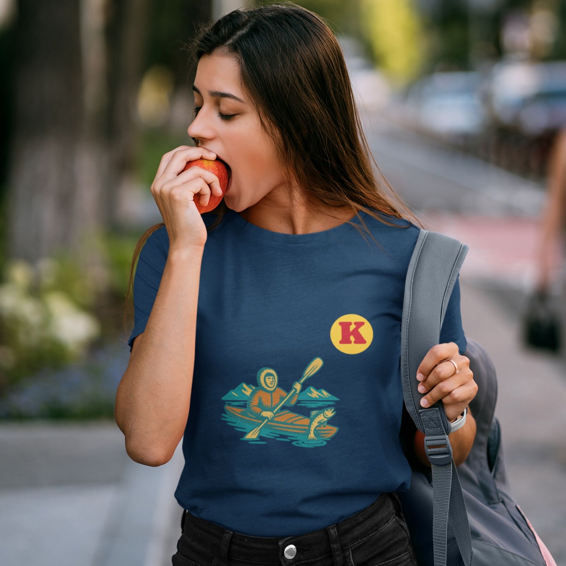 Woman wearing a Navy colour Canadian Made T shirt featuring the Kayak from the Canadian ABC collection by Maple Beaver