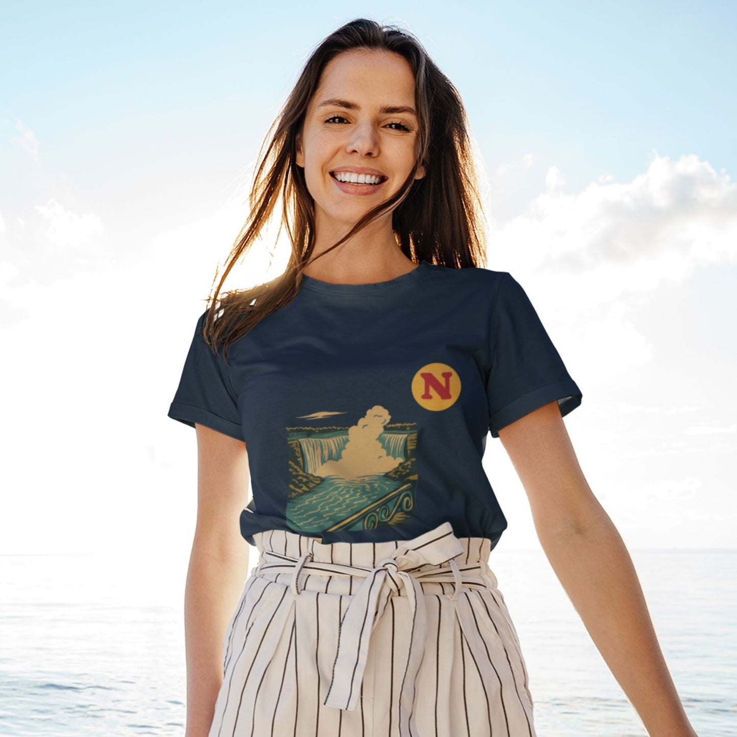 Woman wearing the Niagara Falls Canada T shirt in Navy colour from the Canadian ABC collection by Maple Beaver