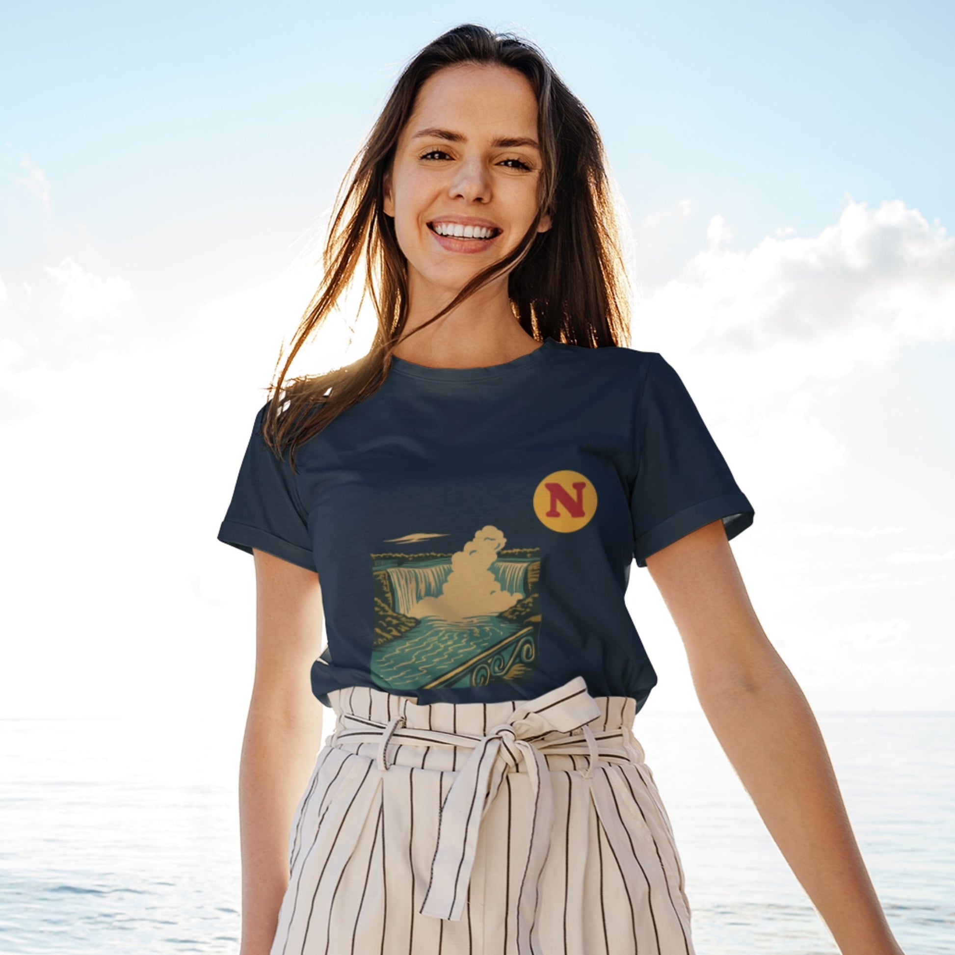 Woman wearing the Niagara Falls Canada T shirt in Navy colour from the Canadian ABC collection by Maple Beaver
