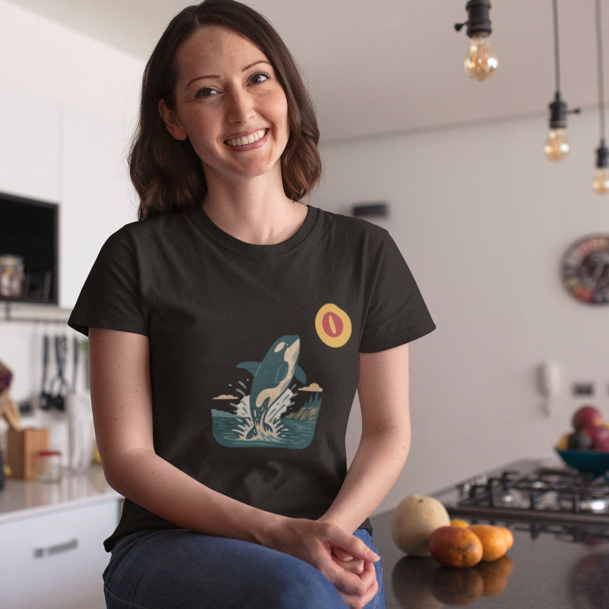 Woman wearing the Canadian Made Orca T shirt in Black colour from the Canadian ABC collection by Maple Beaver