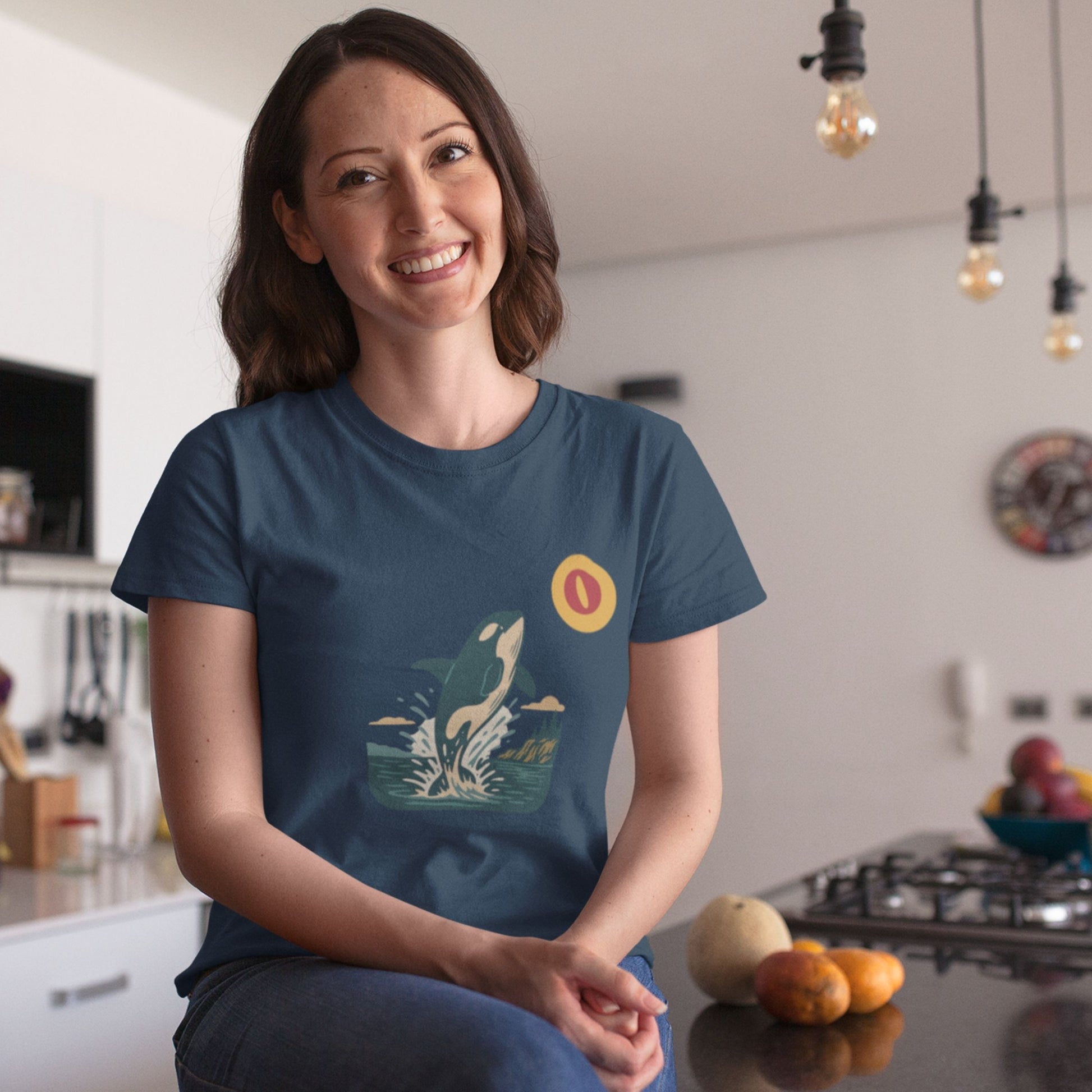 Woman wearing the Canadian Made Orca T shirt in Navy colour from the Canadian ABC collection by Maple Beaver