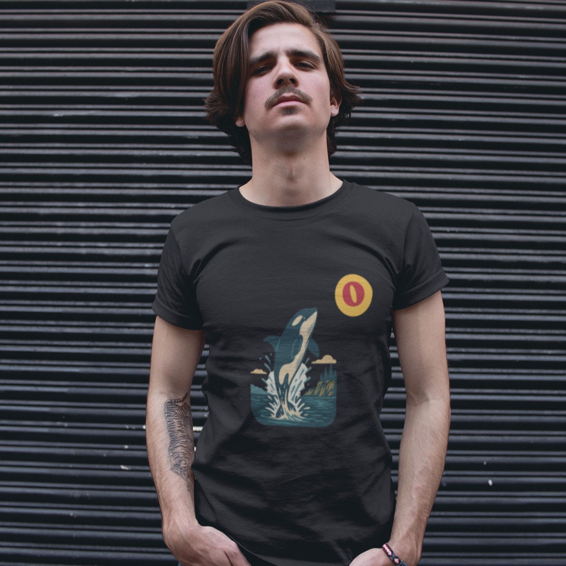 Man wearing the Canadian Made Orca T shirt in Black colour from the Canadian ABC collection by Maple Beaver