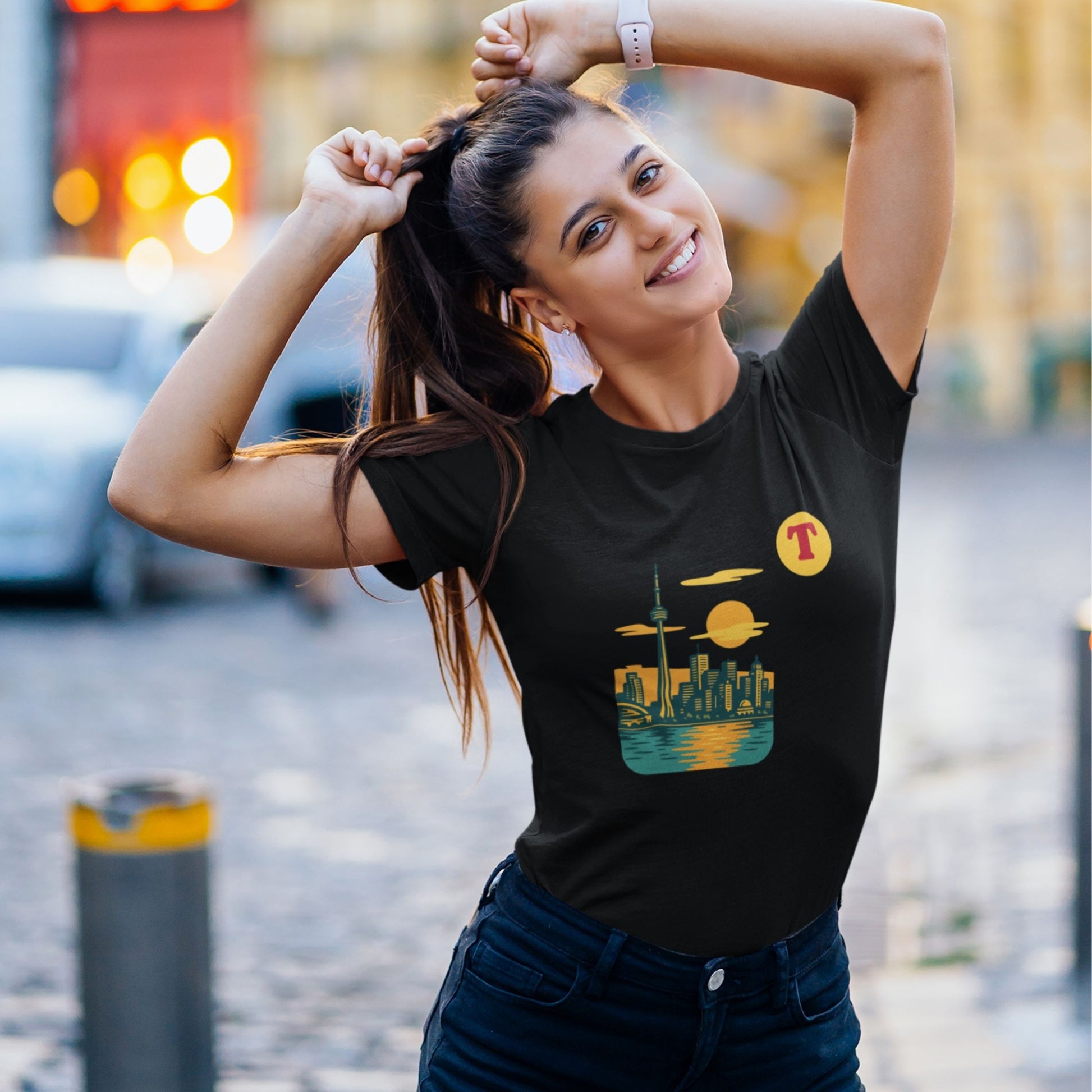 Woman wearing a Toronto Canada T Shirt in Black colour from the Canadian ABC collection by Maple Beaver