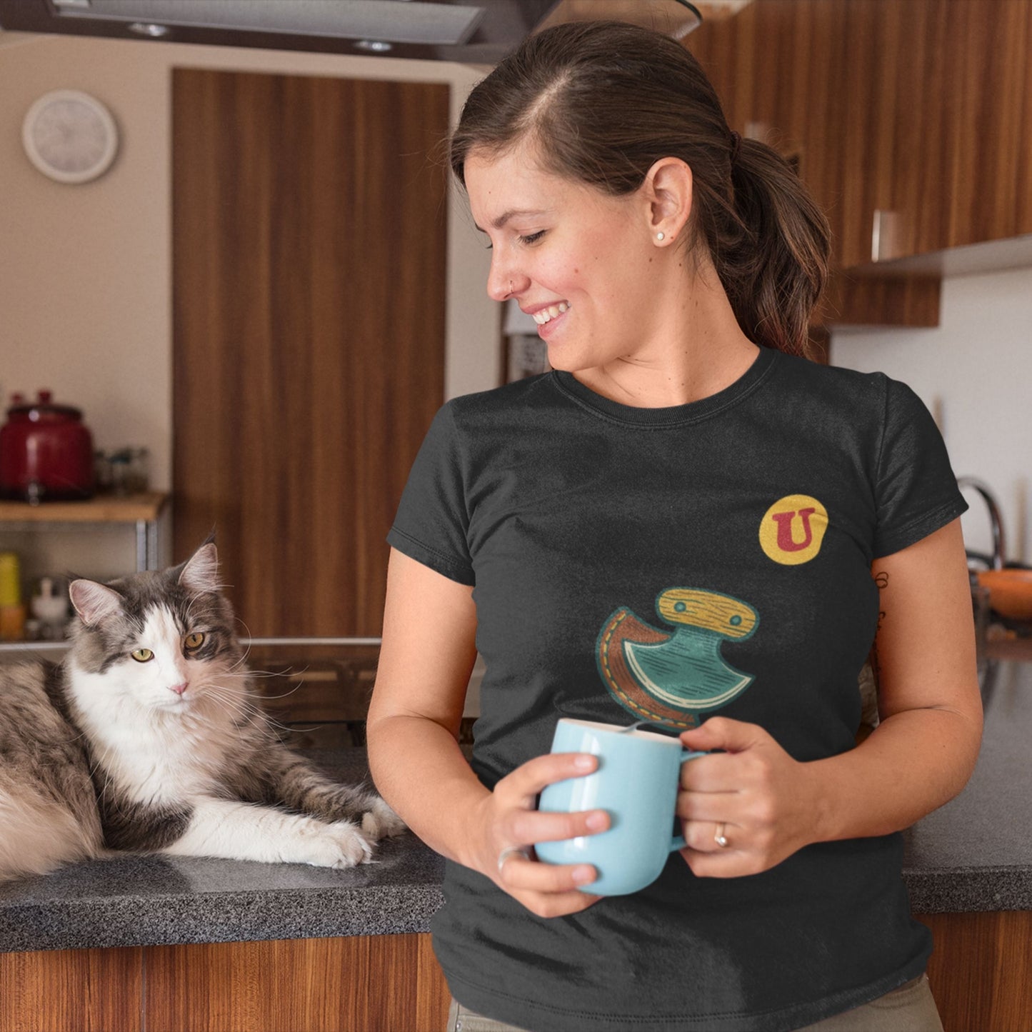 Woman wearing the Canadian Made Ulu Knife T Shirt in Black colour from the Canadian ABC collection by Maple Beaver