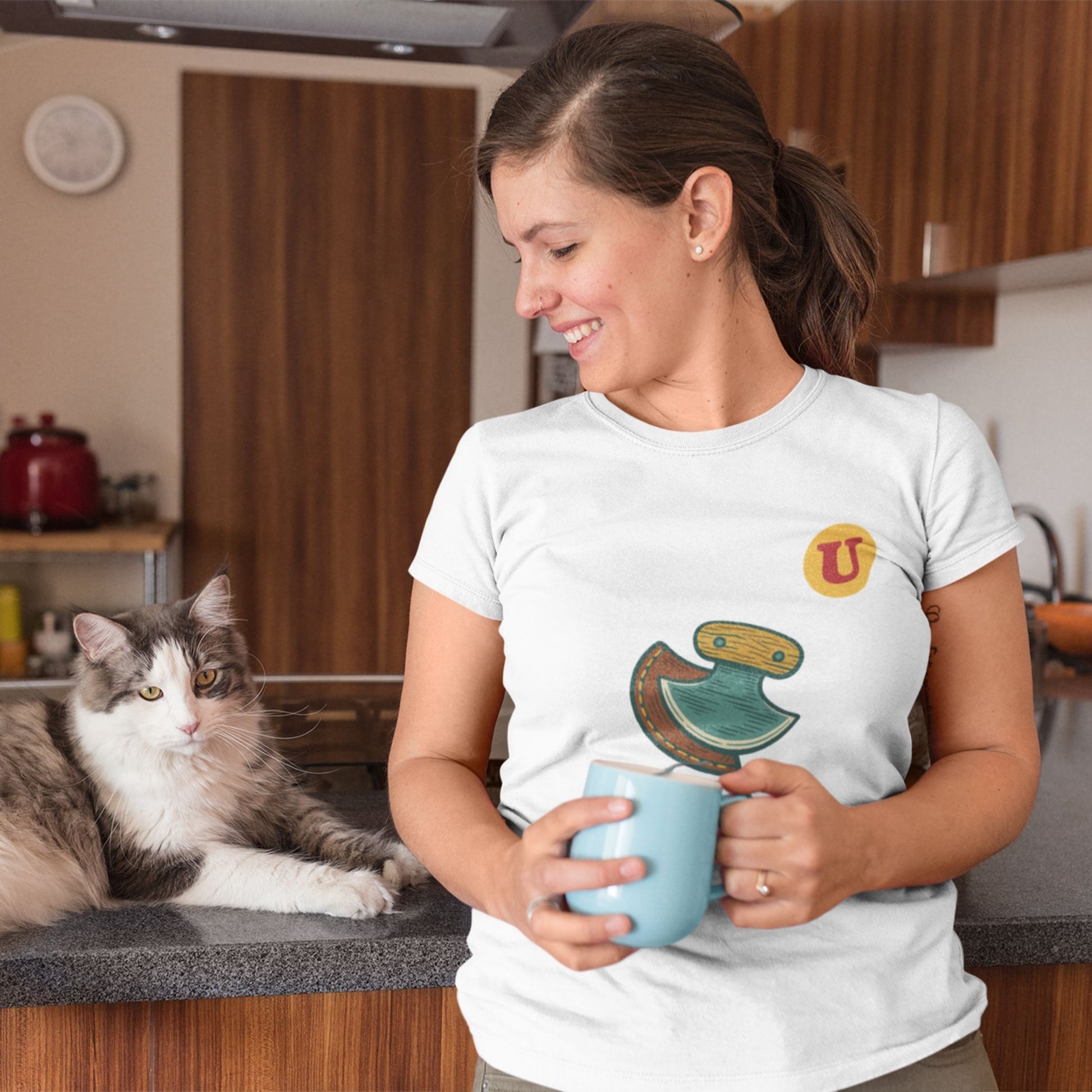 Woman wearing the Canadian Made Ulu Knife T Shirt in White colour from the Canadian ABC collection by Maple Beaver
