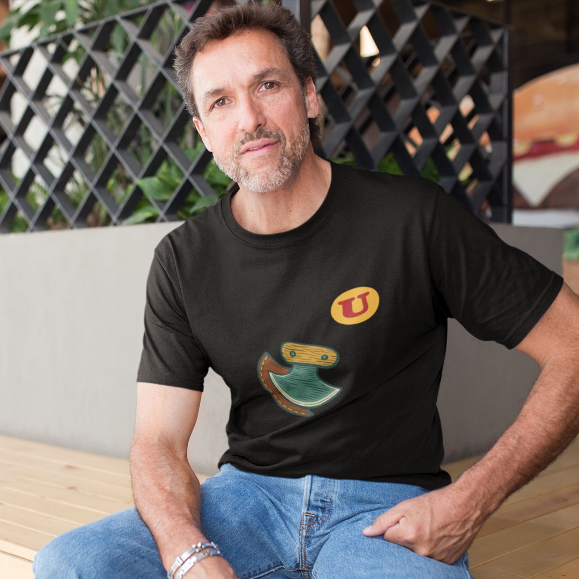 Man wearing the Canadian Made Ulu Knife T Shirt in Black colour from the Canadian ABC collection by Maple Beaver
