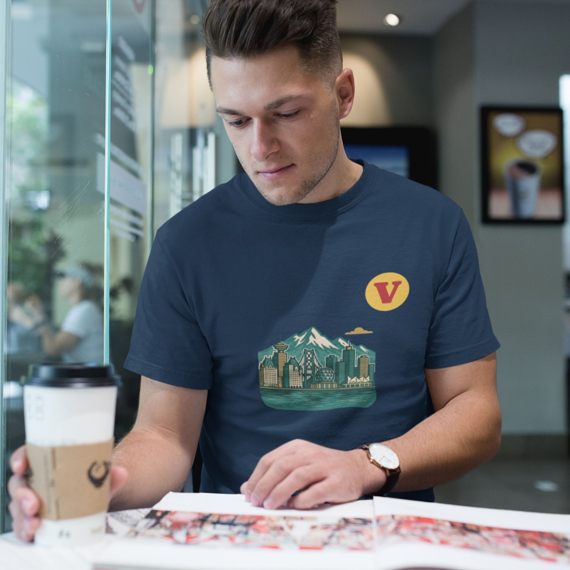 Man wearing the Vancouver Canada T Shirt in Navy colour from the Canadian ABC collection by Maple Beaver. Made in Canada in Organic Cotton.