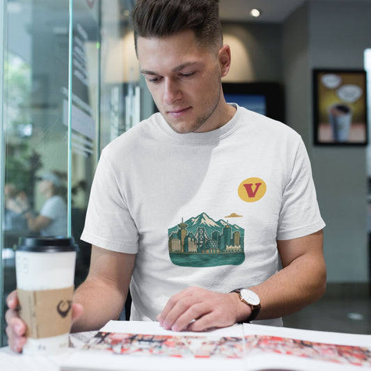 Man wearing the Vancouver Canada T Shirt in white colour from the Canadian ABC collection by Maple Beaver. Made in Canada in Organic Cotton.