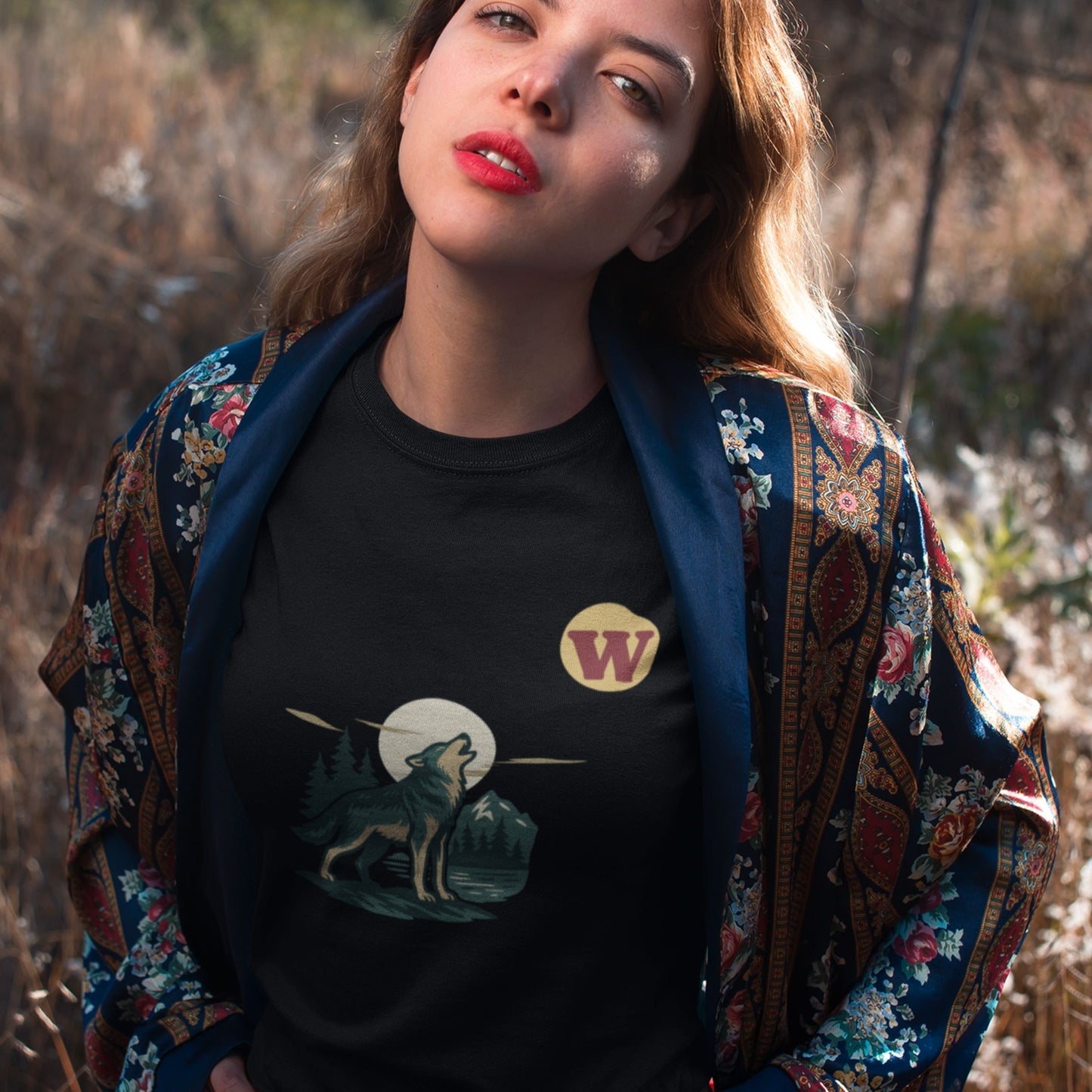 Woman wearing the Made in Canada Wolf T Shirt in Black colour from the Canadian ABC collection by Maple Beaver