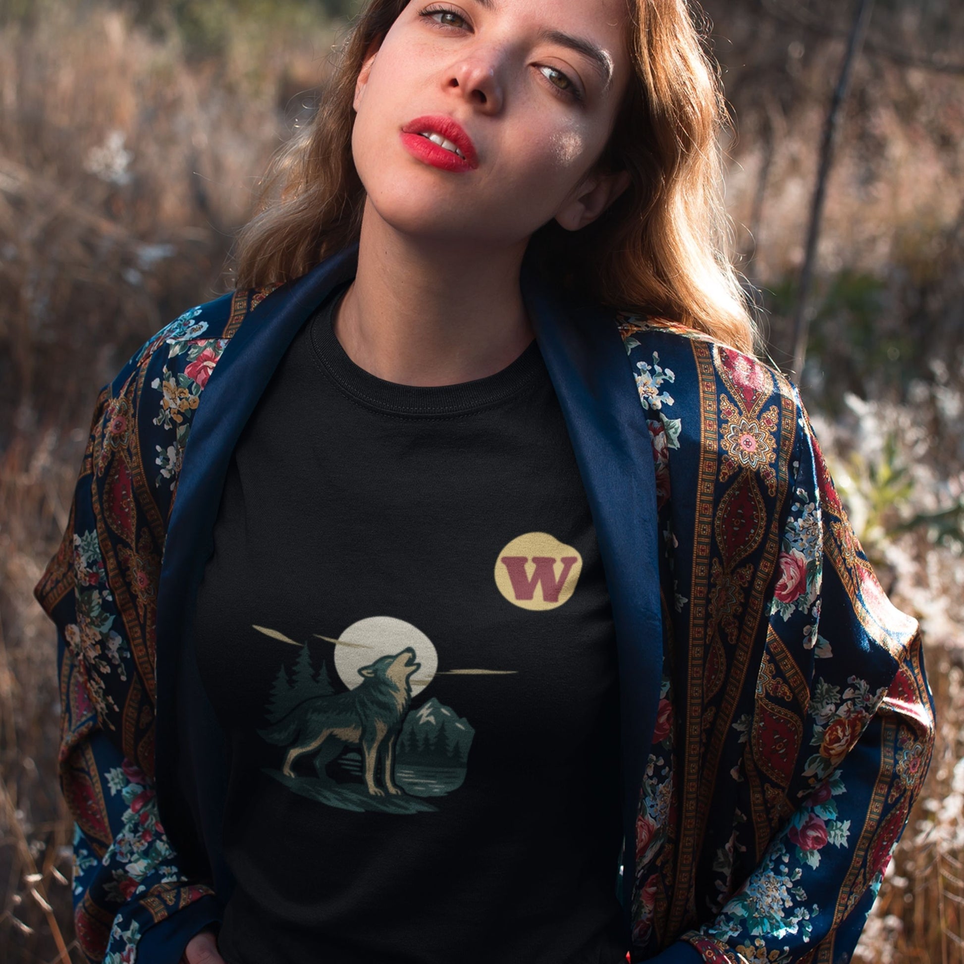 Woman wearing the Made in Canada Wolf T Shirt in Black colour from the Canadian ABC collection by Maple Beaver