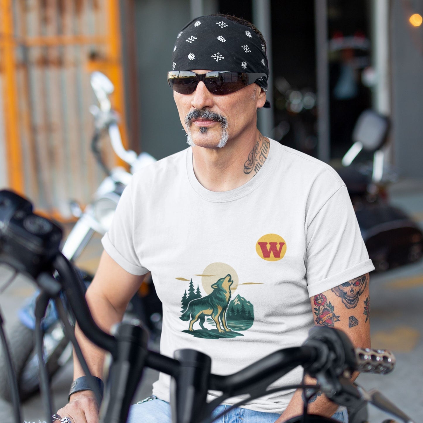 Man wearing the Made in Canada Wolf T Shirt in White colour from the Canadian ABC collection by Maple Beaver