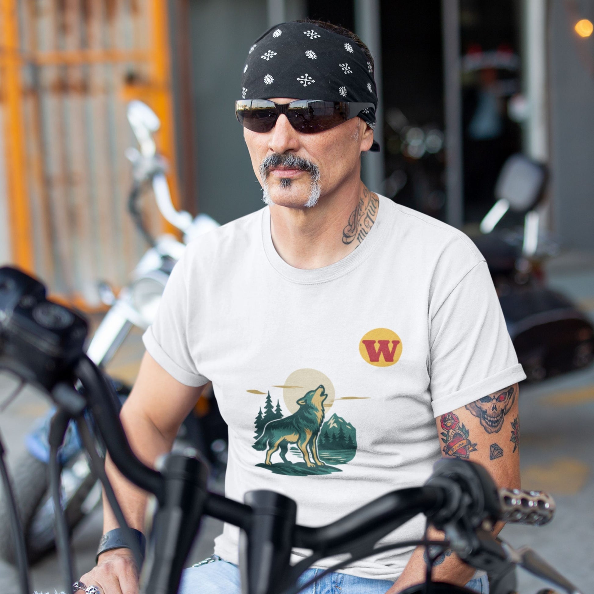 Man wearing the Made in Canada Wolf T Shirt in White colour from the Canadian ABC collection by Maple Beaver