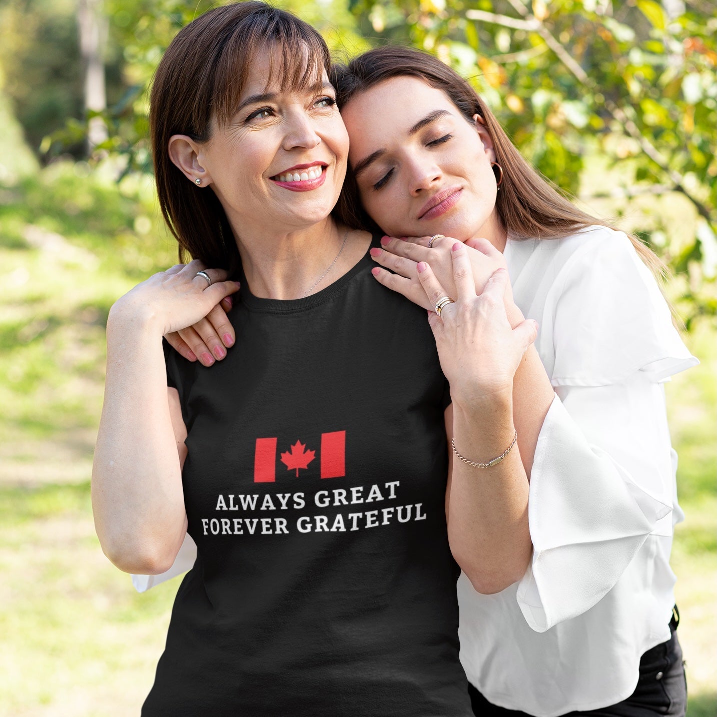 Woman wearing a Black Canada Flag T Shirt with the Always Great Forever Grateful quote