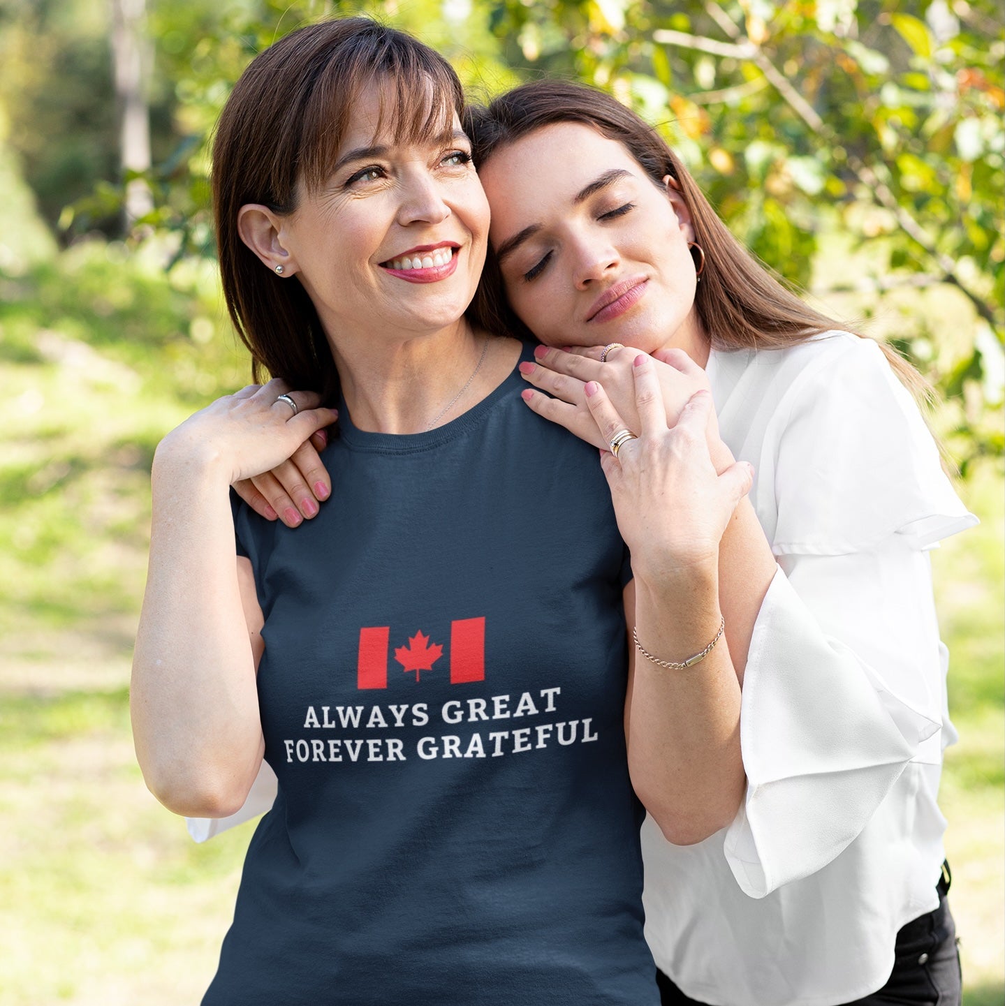 Woman wearing a Navy Canada Flag T Shirt with the Always Great Forever Grateful quote