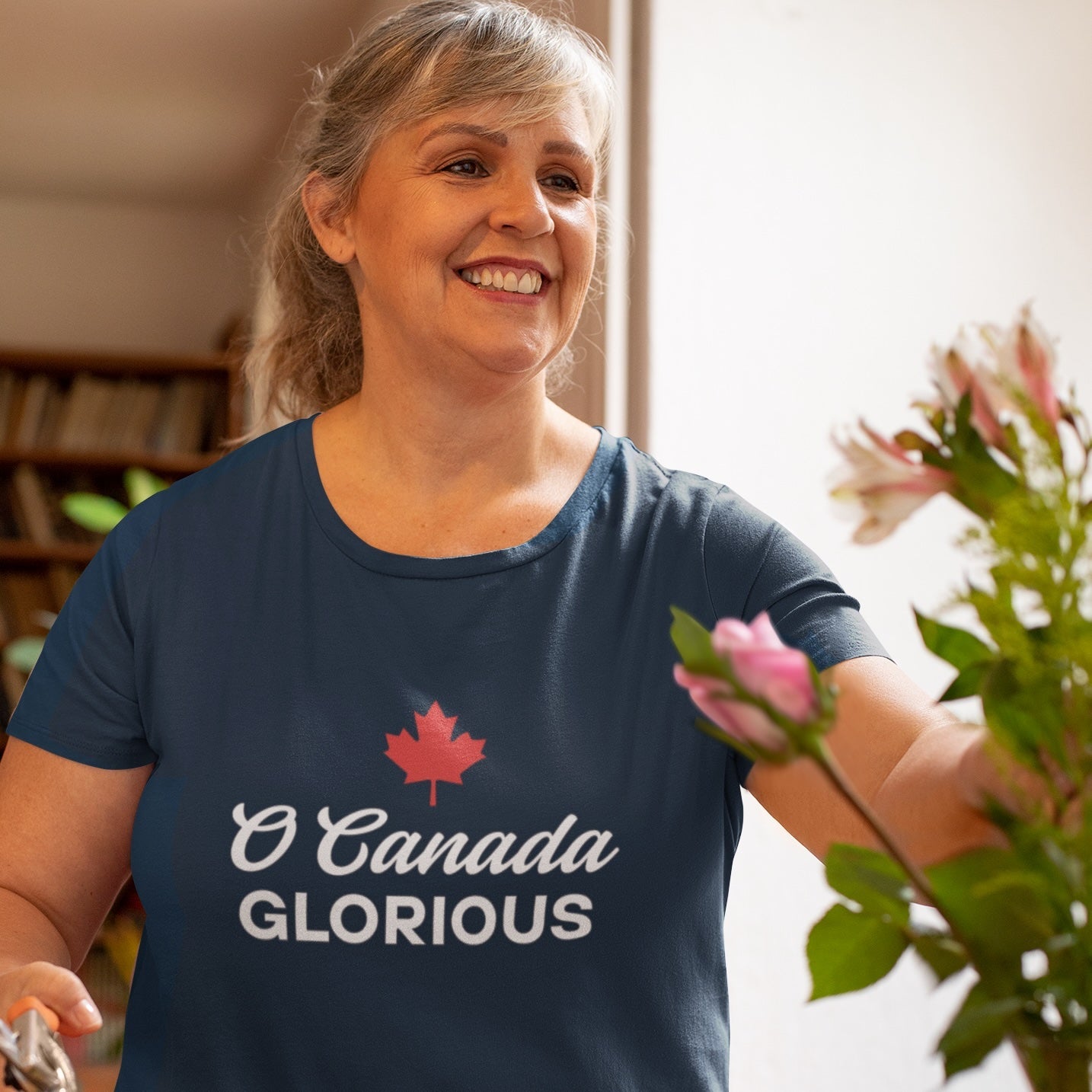 Woman wearing the O Canada Glorious Canadian TShirt in Navy colour by Maple Beaver.