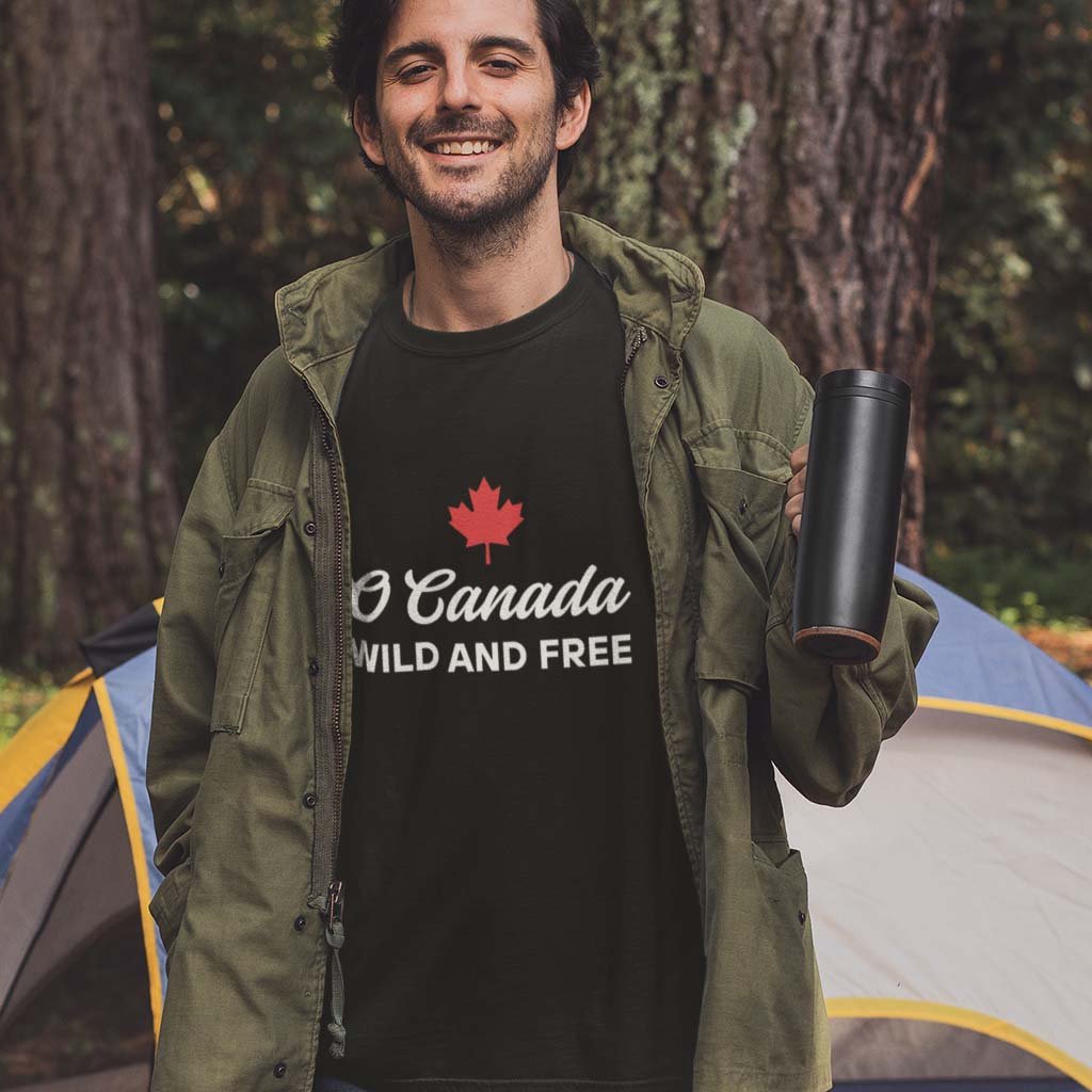Man wearing the O Canada Wild and Free  Canadian TShirt in Black colour by Maple Beaver.