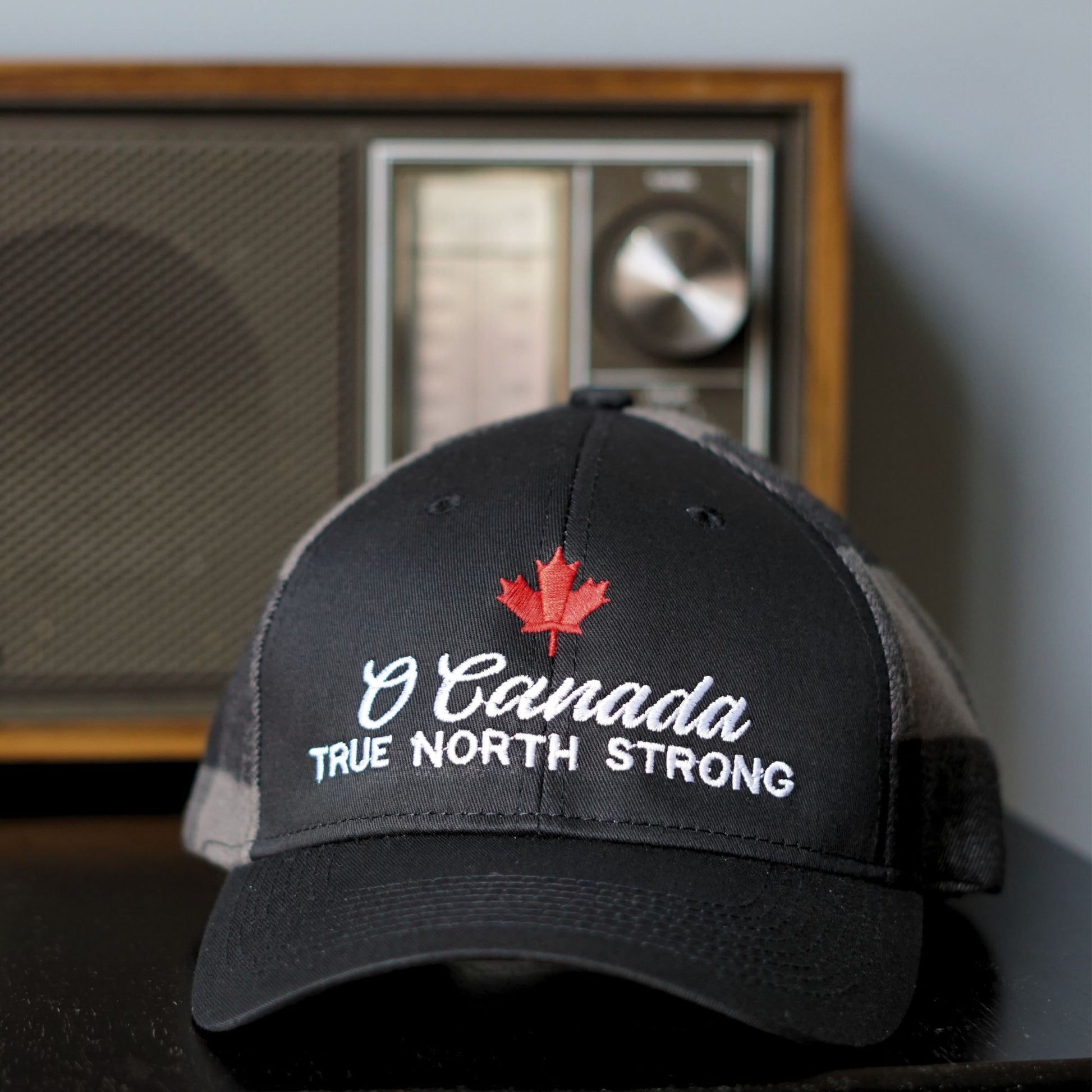 Front view of the Canadian Cap – O Canada True North Strong Charcoal grey plaid Hat
