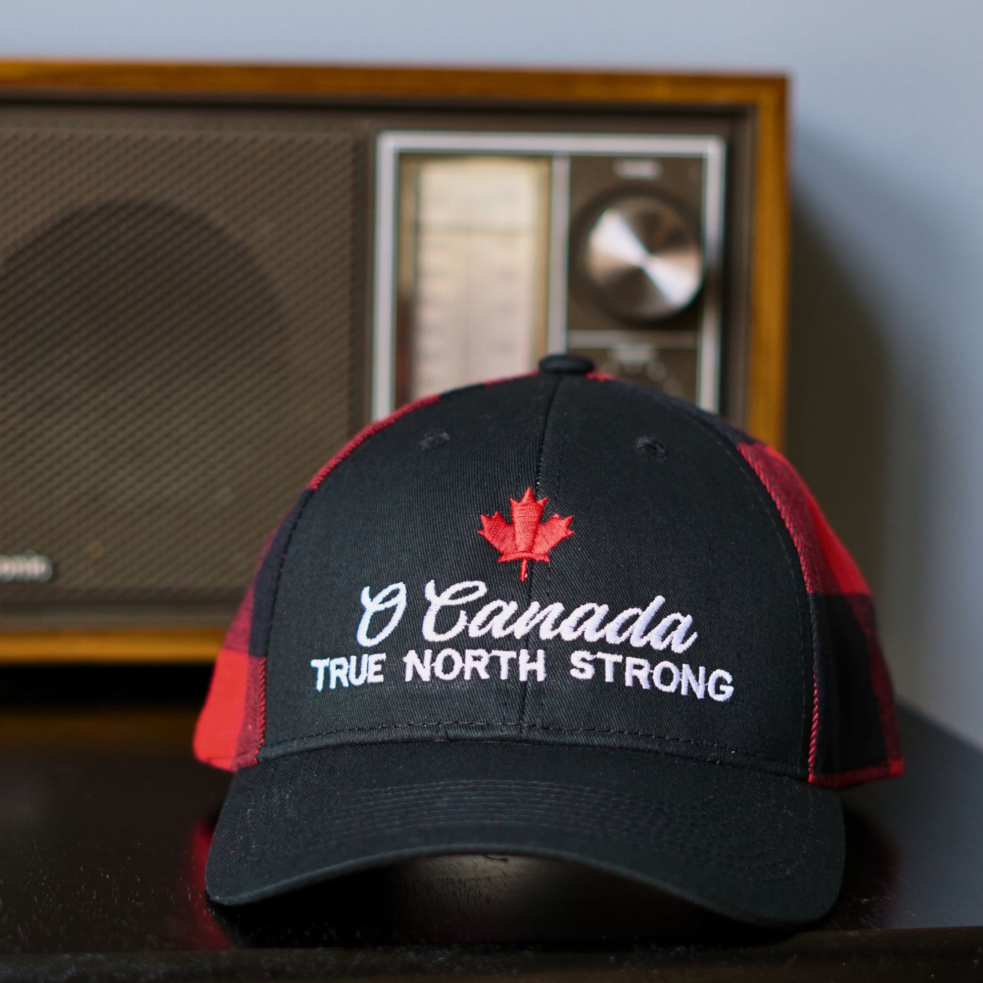 Front view of the Canadian Cap – O Canada True North Strong Charcoal red plaid Hat