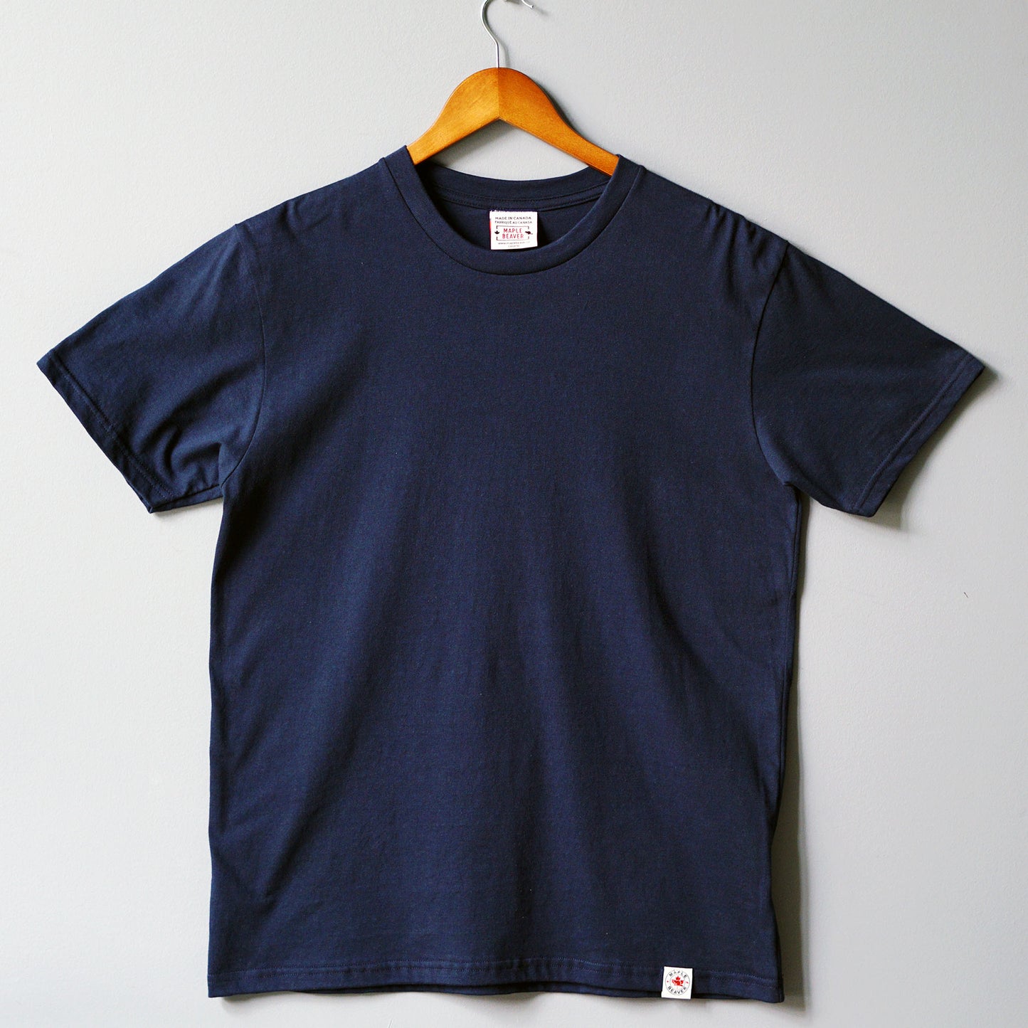 full front view of the Navy Organic Cotton T Shirt – Minimalist Sustainable Tee Made in Canada