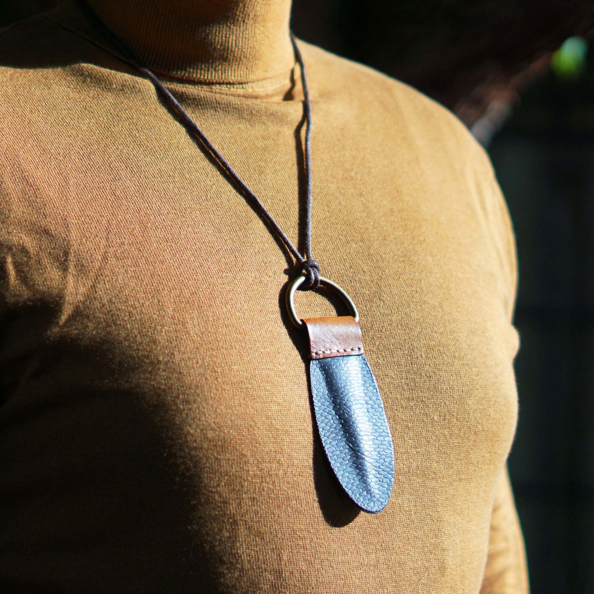 Beavertag worn around the neck as a fashion accessory
