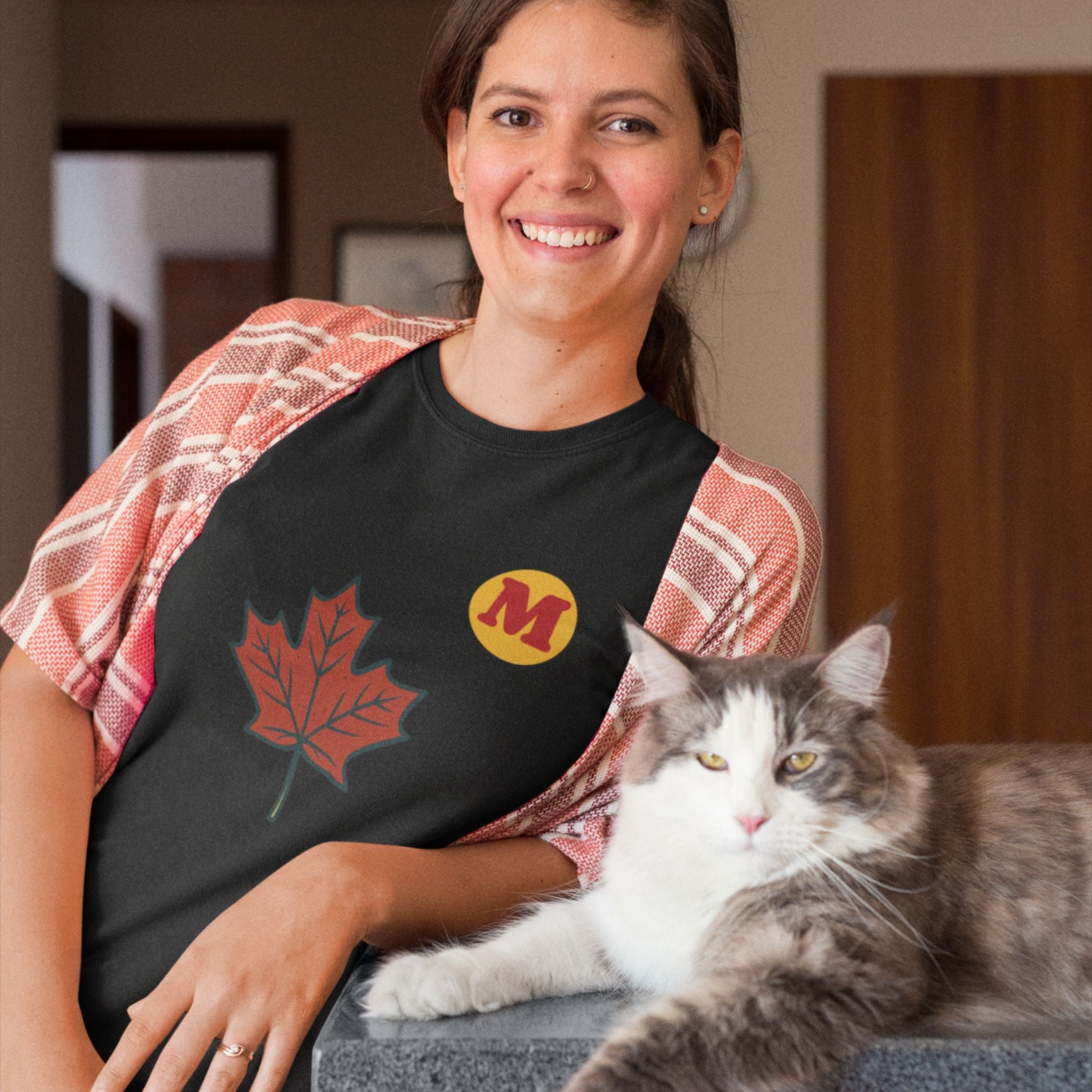 Woman wearing the Maple Leaf Canada T shirt in Black colour from the Canadian ABC collection by Maple Beaver