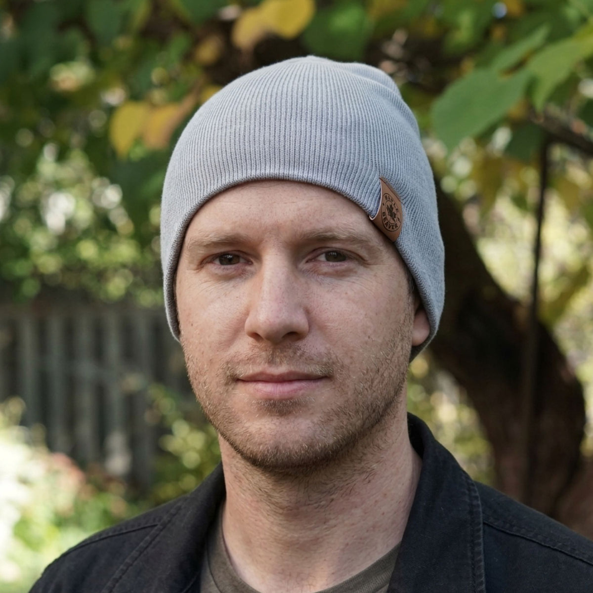 Grey Maple Beaver Merino blend beanie worn by an adult