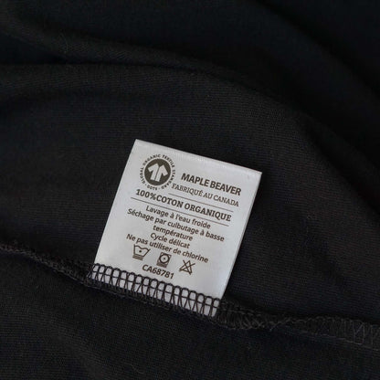 Canadian Made Organic Cotton T shirt in Black colour by Maple Beaver, closeup of care instructions tag