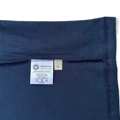 Canadian Made Organic Cotton T shirt in Navy colour by Maple Beaver, closeup of care label.
