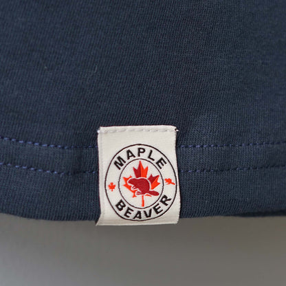 Canadian Made Organic Cotton T shirt in Navy colour by Maple Beaver, closeup of bottom hem tag.