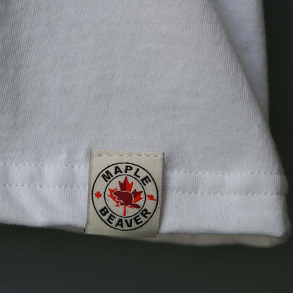 Canadian Made Organic Cotton T shirt in White colour by Maple Beaver, closeup of of bottom hem.