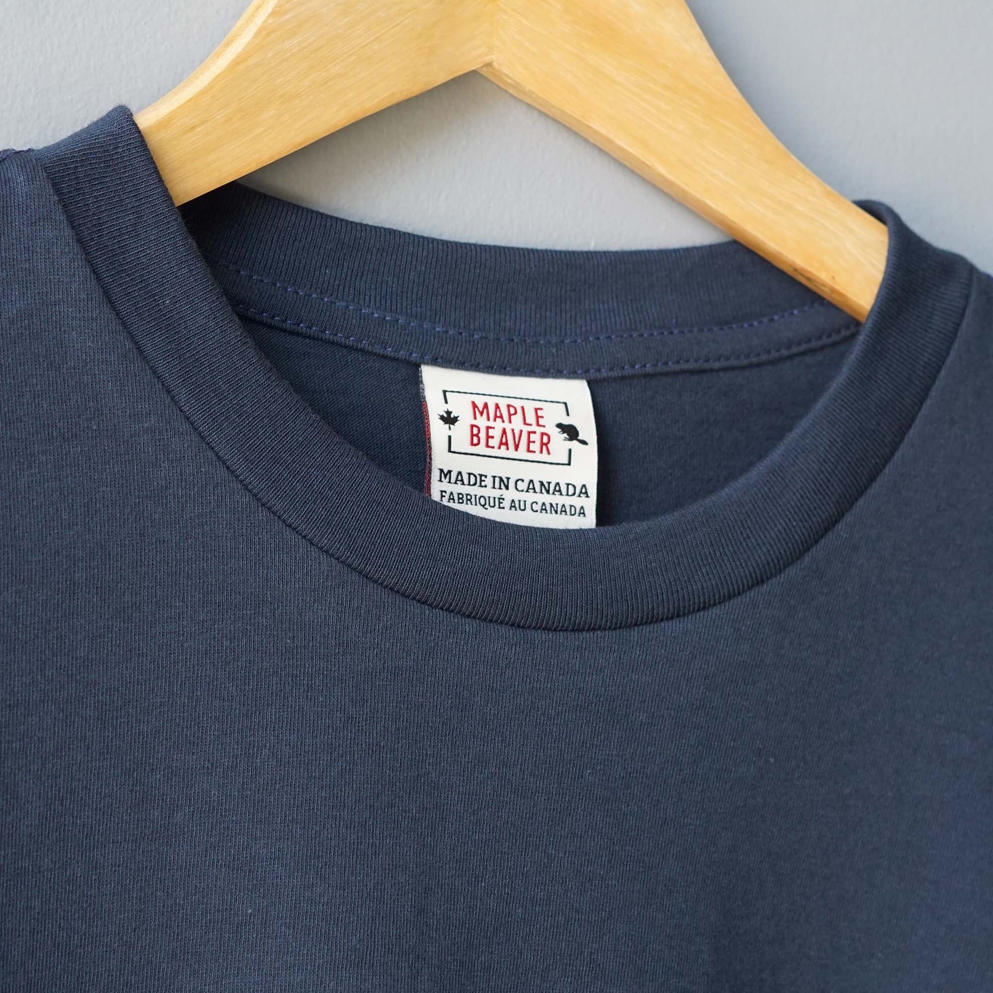 Canadian Made Organic Cotton T shirt in Navy colour by Maple Beaver, closeup of crew neck.
